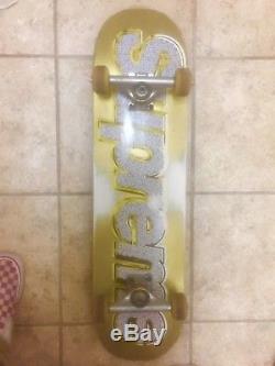 Supreme Bling Skateboard with supreme trucks and a surprise gift 
