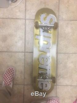 Supreme Bling Skateboard with supreme trucks and a surprise gift 